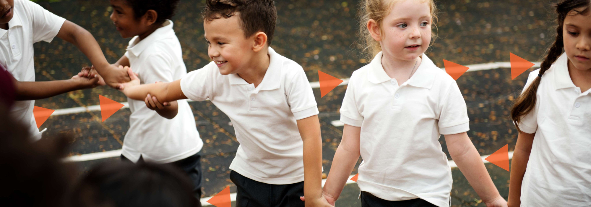 Primary children in yard